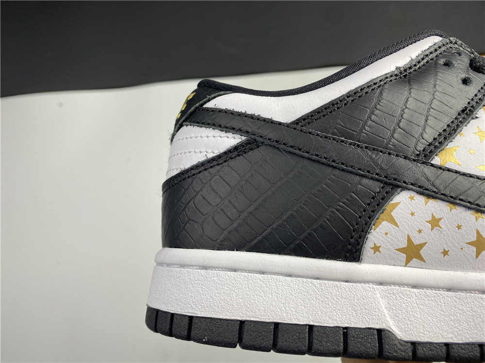 from Supreme x Nike SB Dunk Low DH3228-102