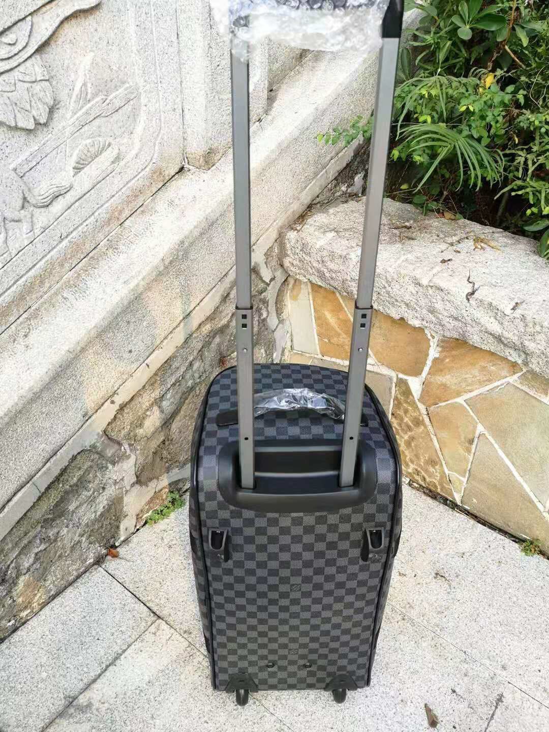 L*ouis V*uitton Luggage